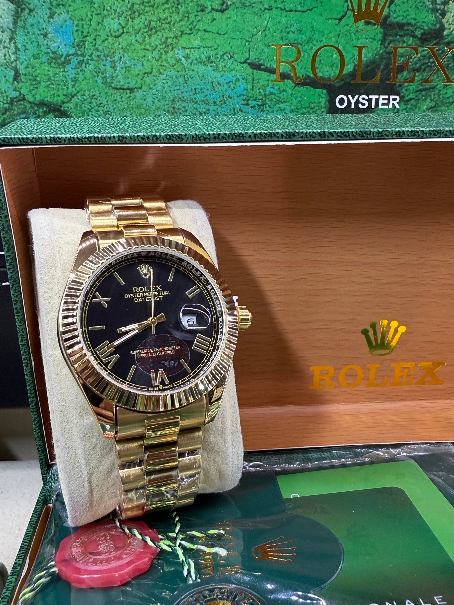Date just 41mm gold black arabic dial