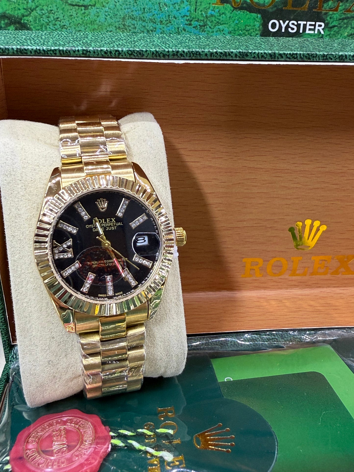 Date just 36mm gold black arabic dial