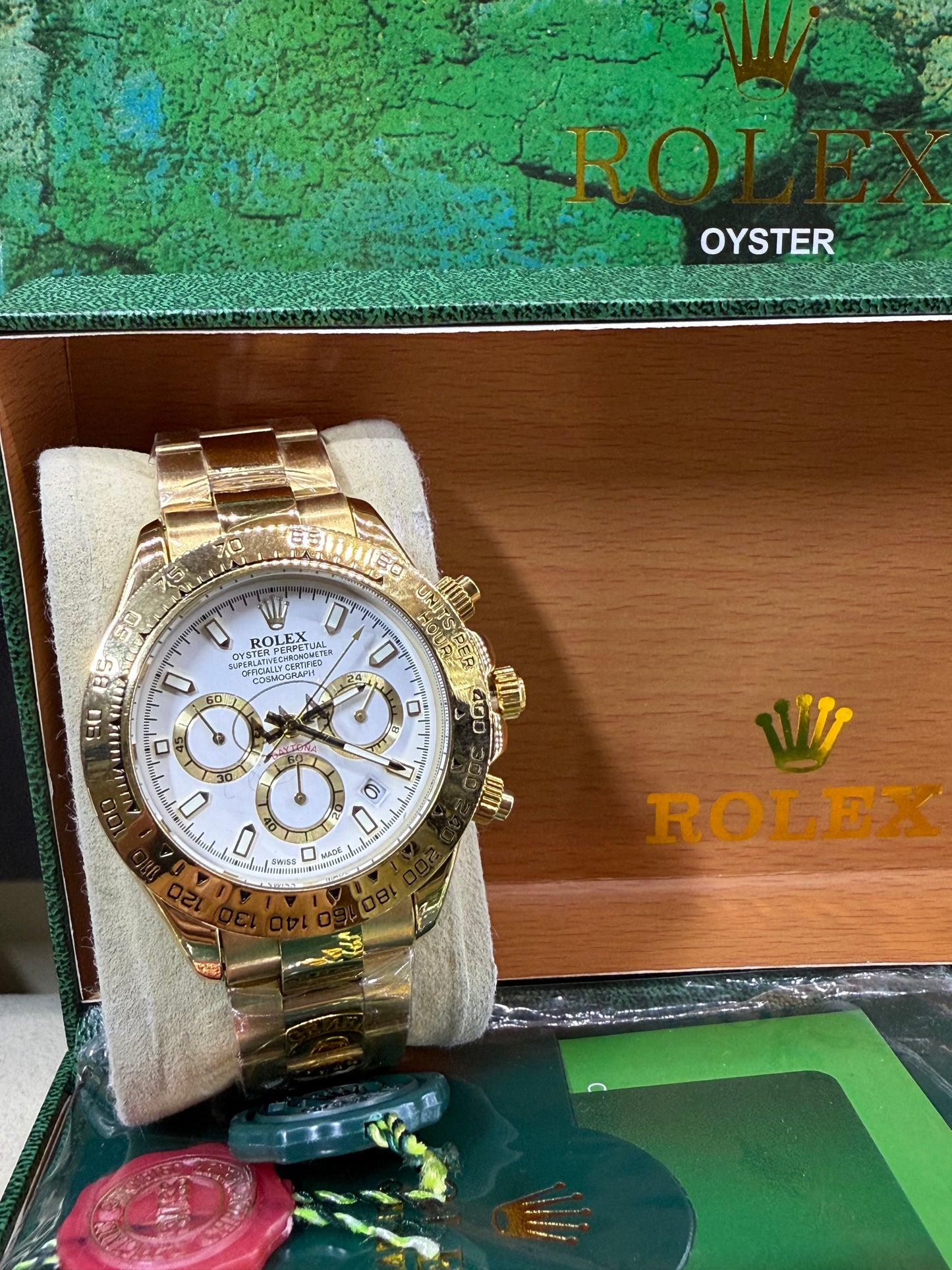 Daytona 40mm gold white dial